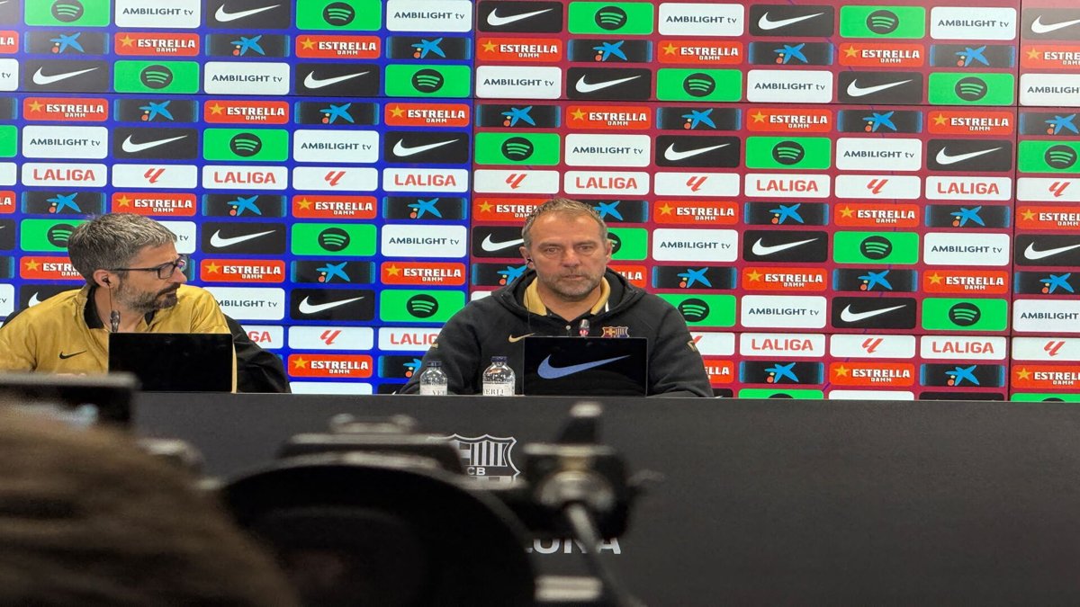 Hansi Flick speaking at an FC Barcelona press conference in April 2025
